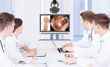 doctors with telehealth cart for video conferencing
